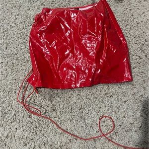 Red “leather” skirt, ties on side, shein